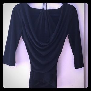 Black top, halter lining and scalloped neckline